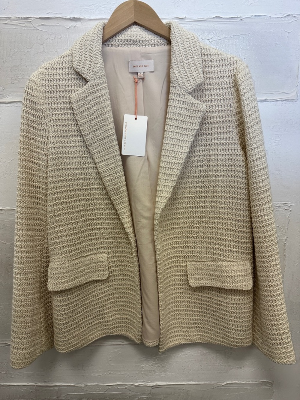 New with tags. Natural color blazer. Skies are blue. Small.